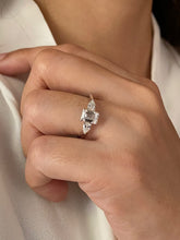 Trilogy Emerald Cut Diamond Engagement ring